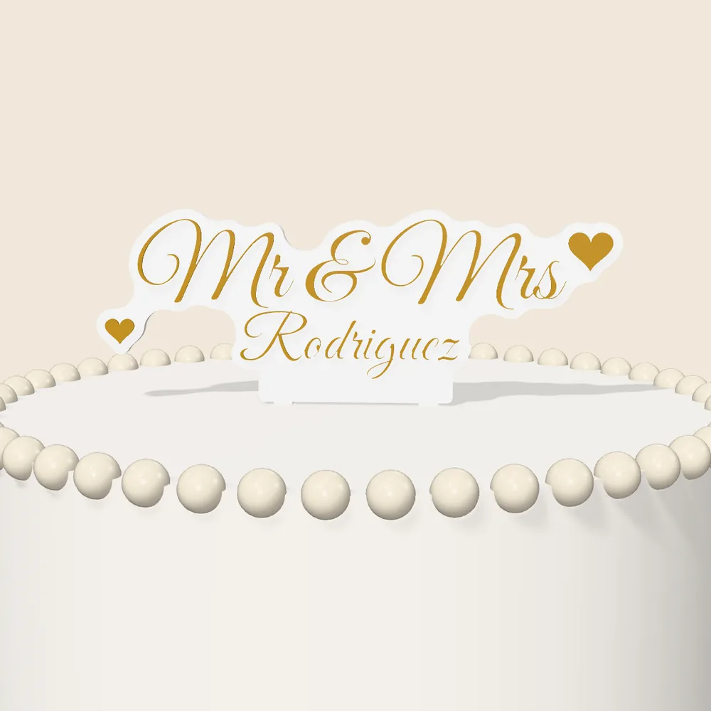 Gold script Mr and Mrs wedding cake topper