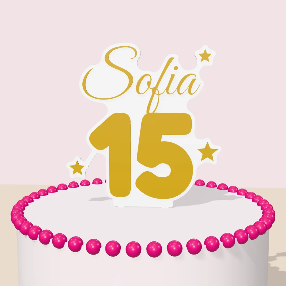 Gold Sofia 15 cake topper on a pink cake